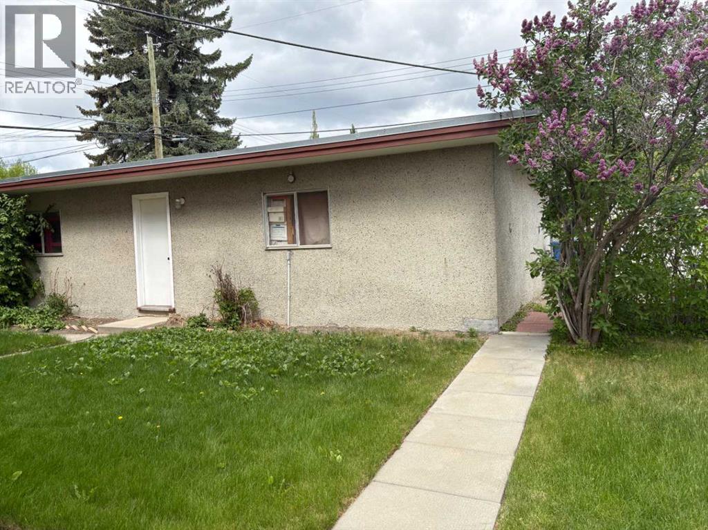 Multi-family House for Sale in    Avenue NW Banff Trail Calgary 