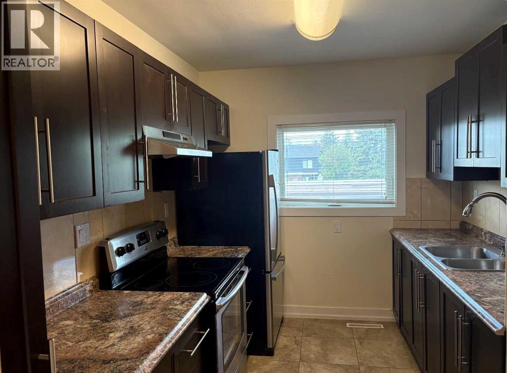 Multi-family House for Sale in    Avenue NW Banff Trail Calgary 