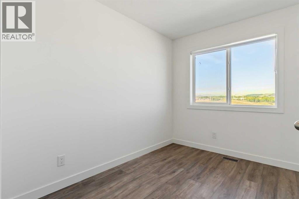 Photo 2 of 203 24 Rivercrest Drive, Cochrane AB