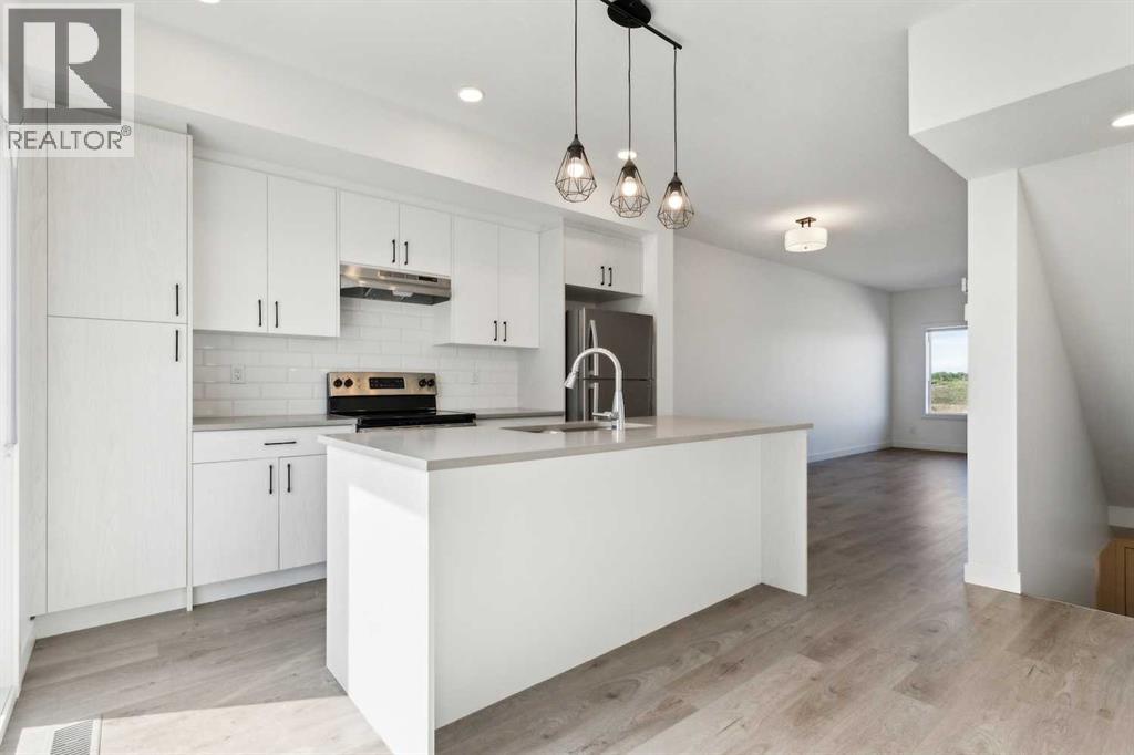 Photo 8 of 203 24 Rivercrest Drive, Cochrane AB