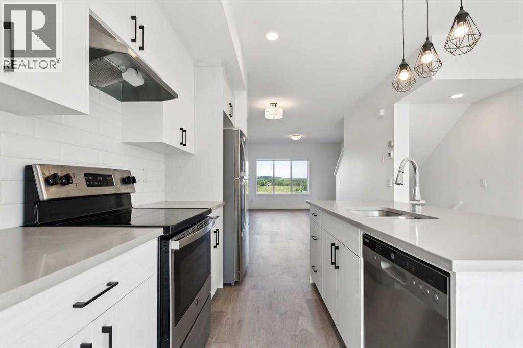 Photo 22 of 203 24 Rivercrest Drive, Cochrane AB
