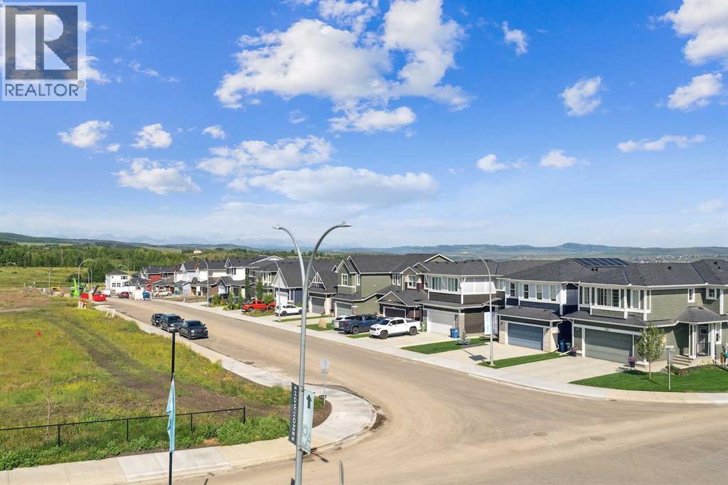 Photo 24 of 203 24 Rivercrest Drive, Cochrane AB