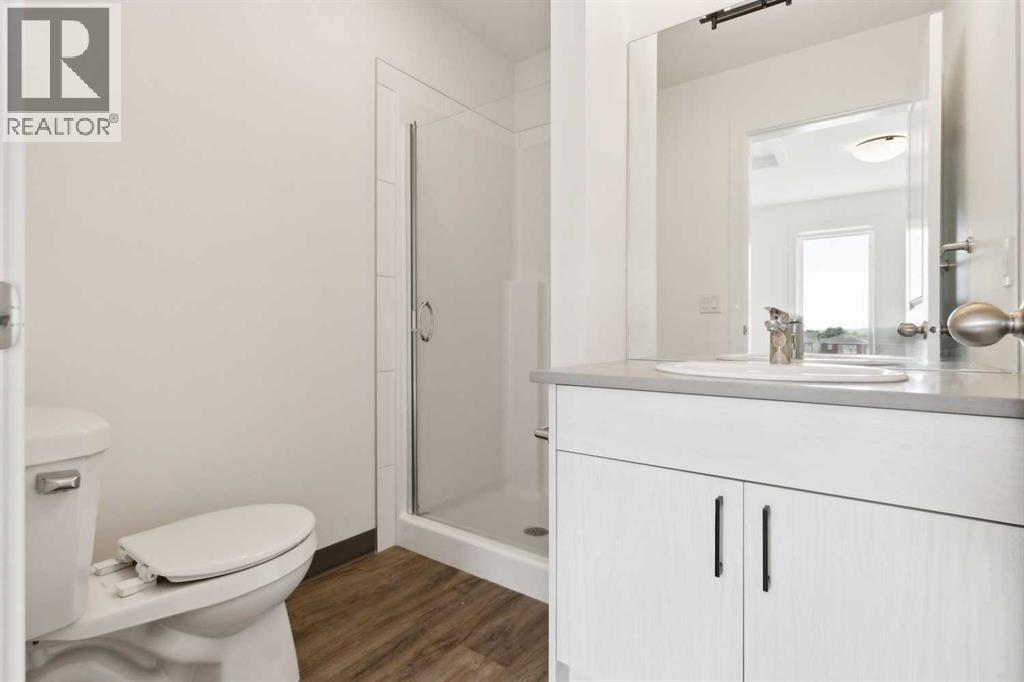 Photo 26 of 203 24 Rivercrest Drive, Cochrane AB
