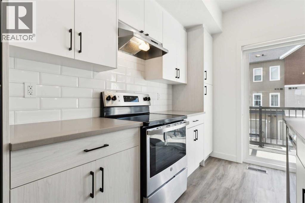 Photo 19 of 703 24 Rivercrest Drive, Cochrane AB