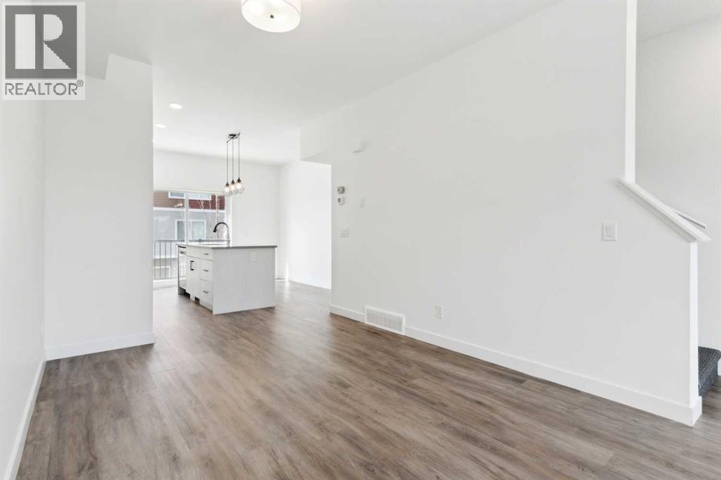 Photo 16 of 703 24 Rivercrest Drive, Cochrane AB