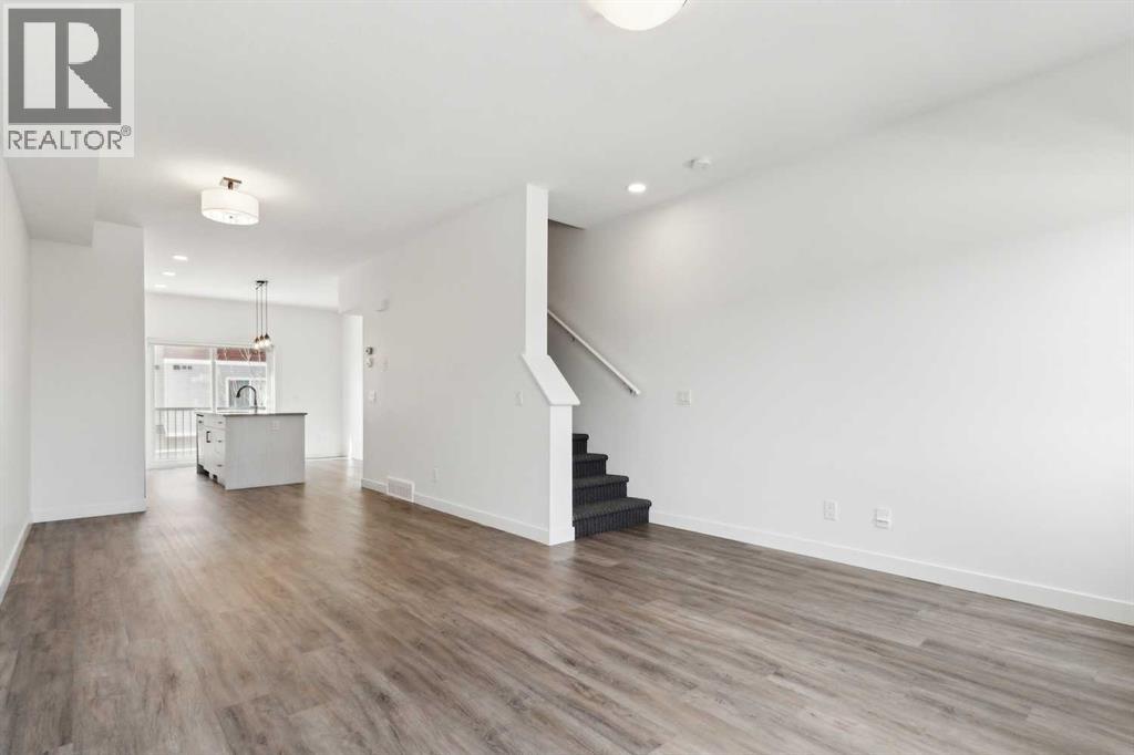 Photo 14 of 703 24 Rivercrest Drive, Cochrane AB