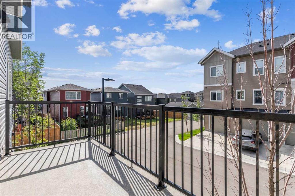 Photo 2 of 703 24 Rivercrest Drive, Cochrane AB