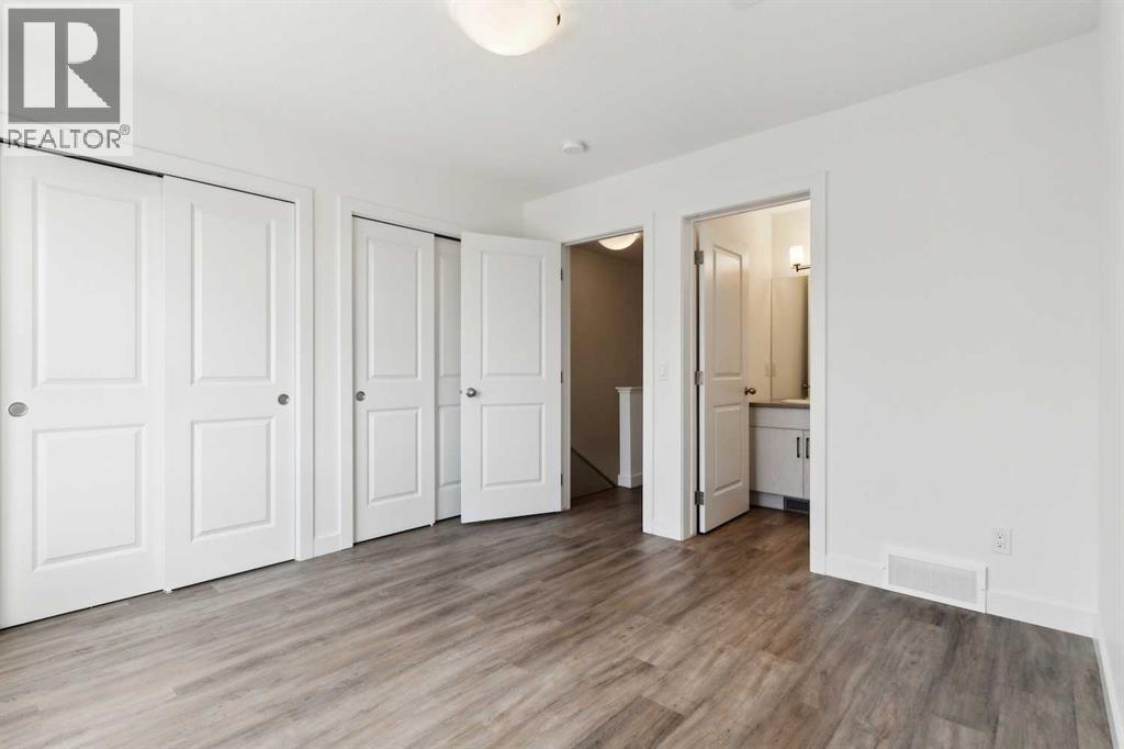 Photo 11 of 703 24 Rivercrest Drive, Cochrane AB