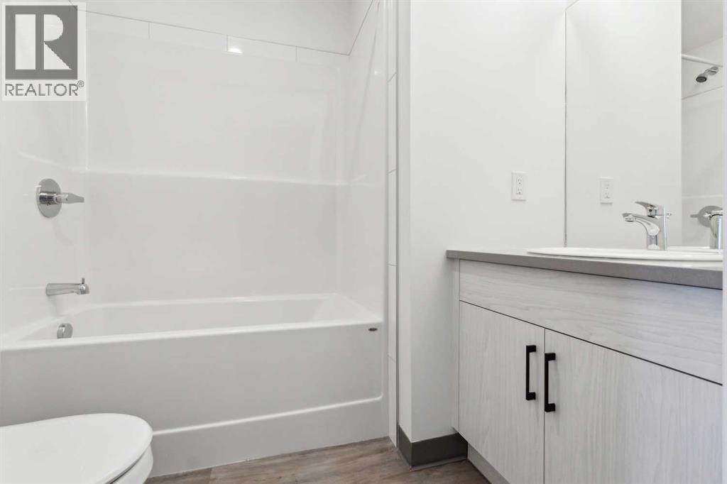 Photo 13 of 703 24 Rivercrest Drive, Cochrane AB