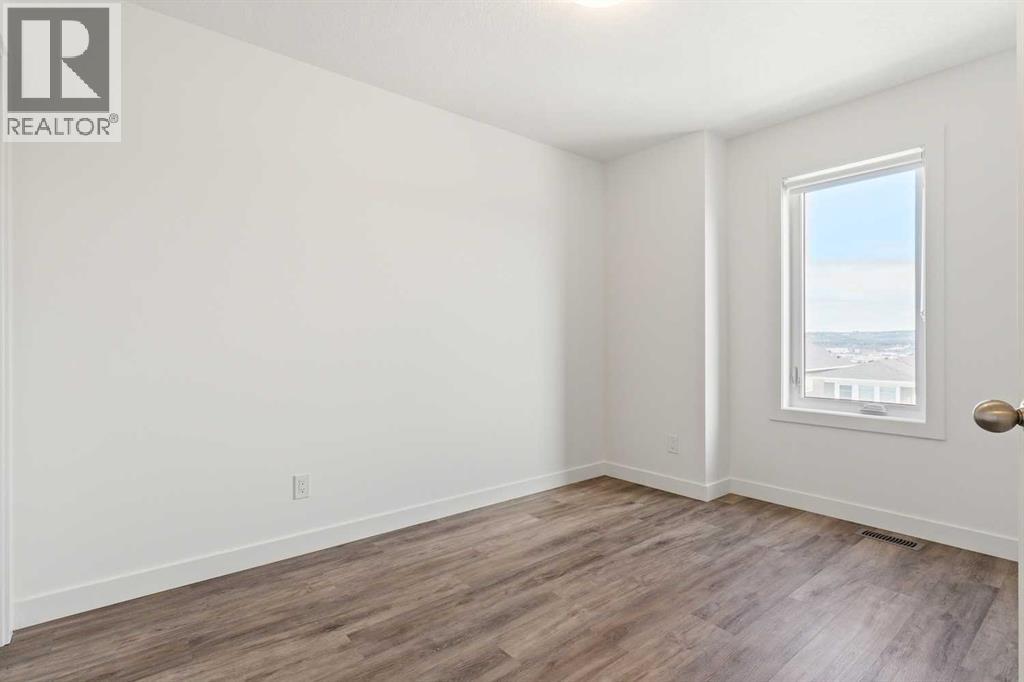 Photo 6 of 703 24 Rivercrest Drive, Cochrane AB
