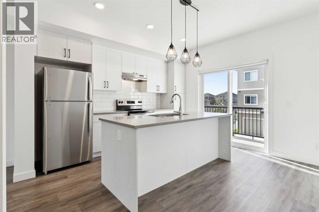 Photo 5 of 703 24 Rivercrest Drive, Cochrane AB