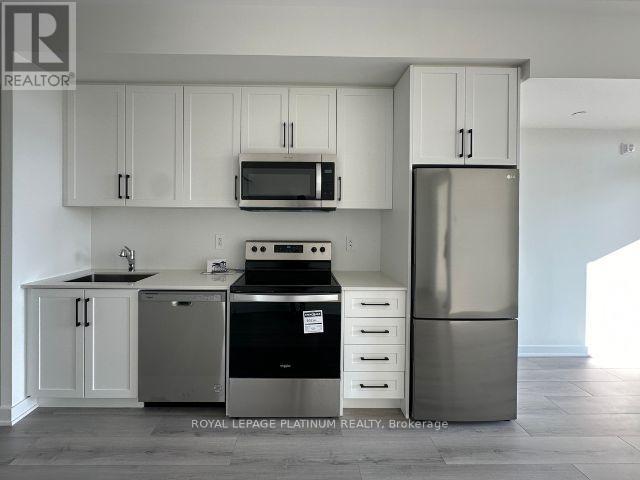 Photo 3 of 405 1440 Clarriage Court, Milton ON