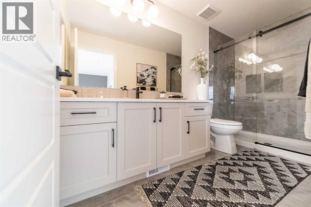 Photo 3 of 495 Lawthorn Way Se, Airdrie AB