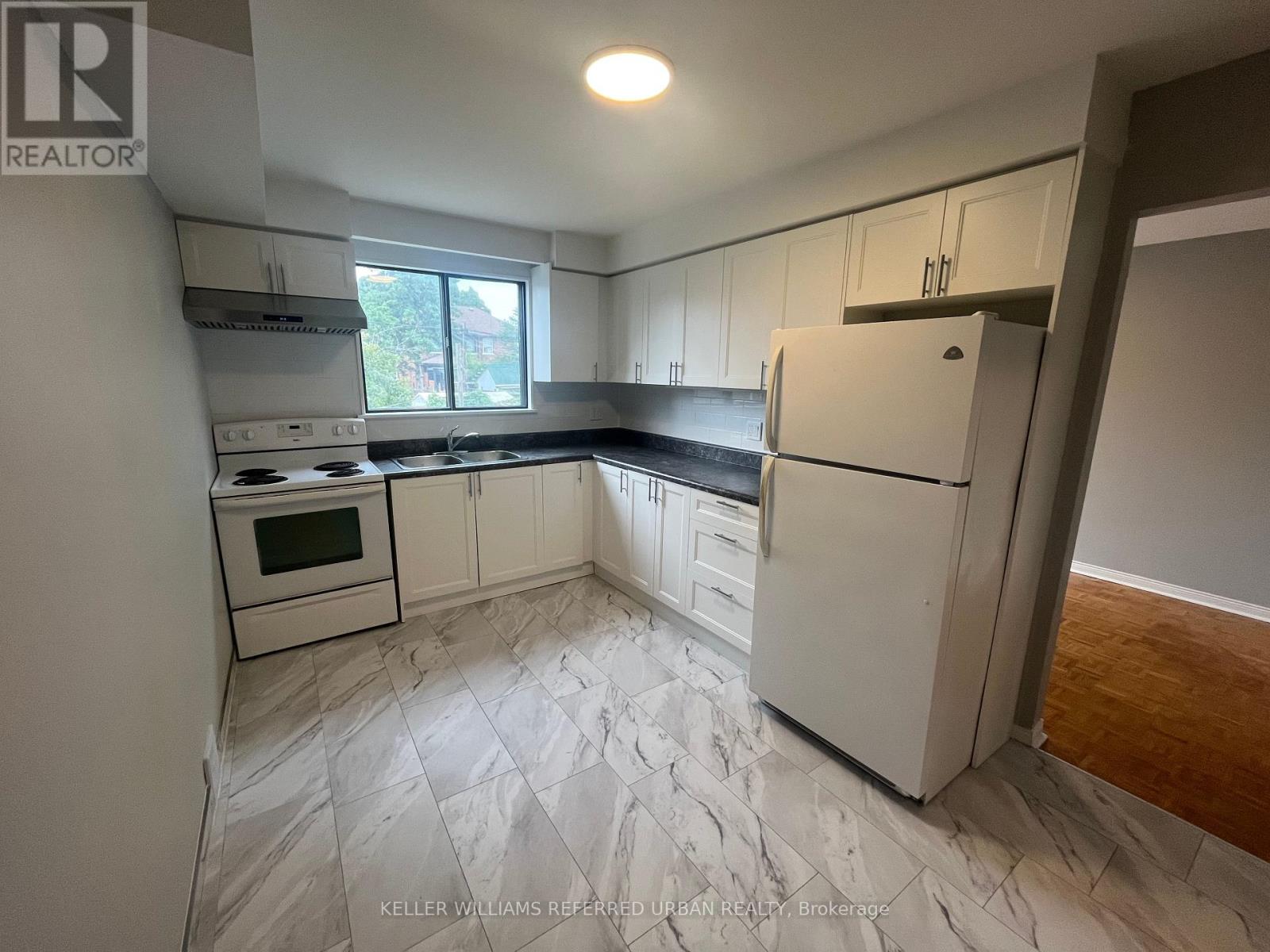 Photo 6 of Main 222 Mortimer Avenue, Toronto ON