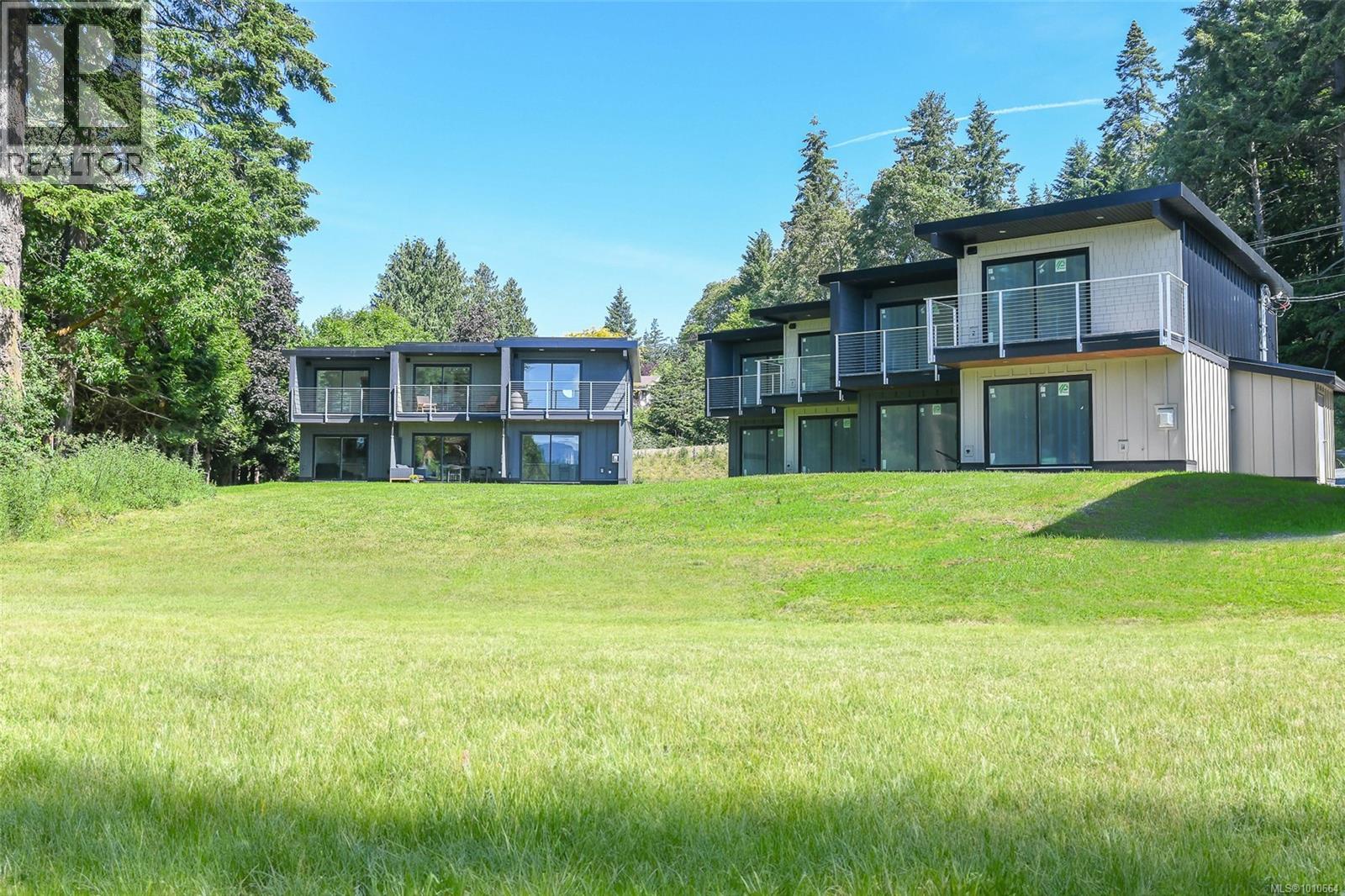 4305 Shingle Spit Rd, Hornby Island - Exteriors - Full Complex View - Photo 3