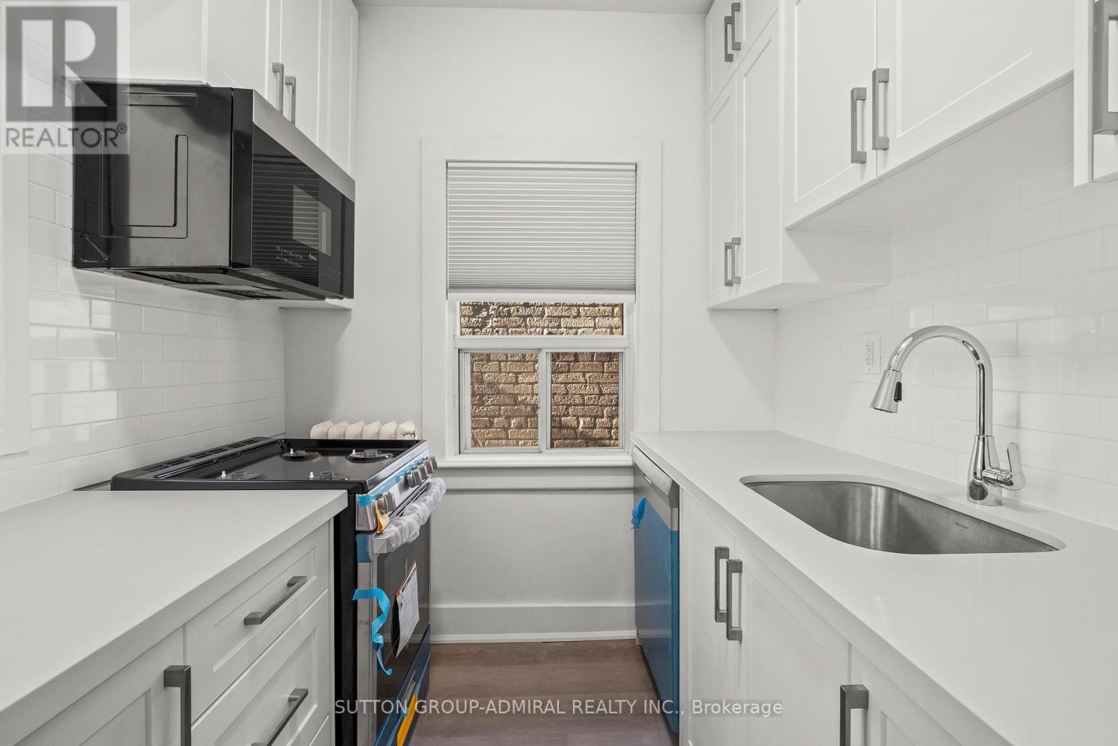 Photo 1 of 3 1963 A Queen Street E, Toronto ON