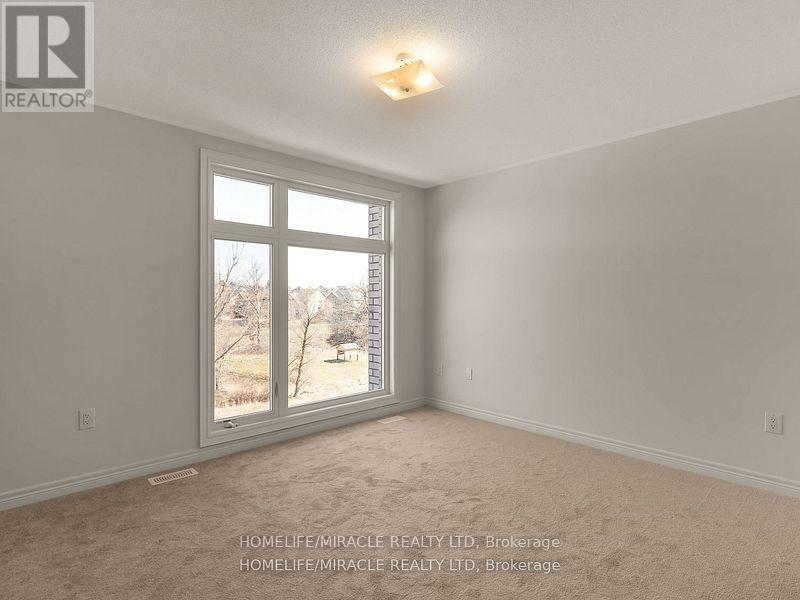 Photo 6 of 18 Queenpost Drive, Brampton ON