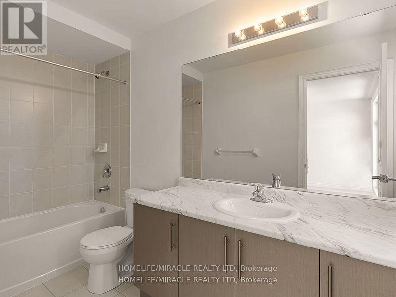 Photo 11 of 18 Queenpost Drive, Brampton ON