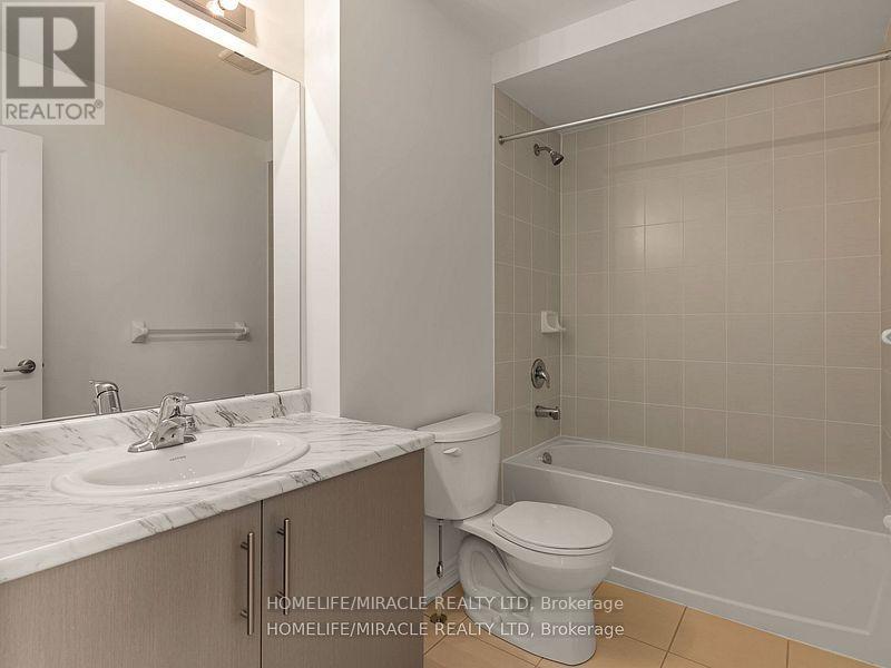 Photo 9 of 18 Queenpost Drive, Brampton ON