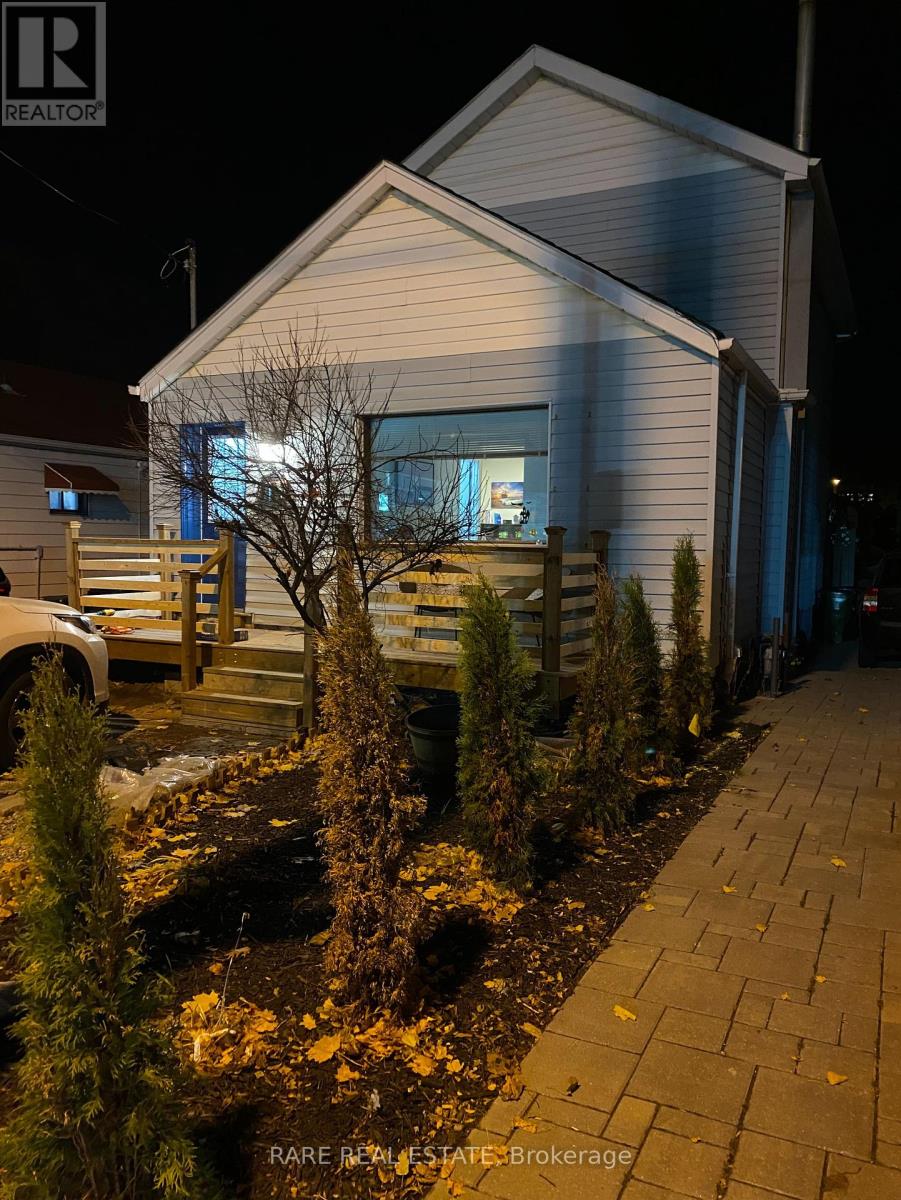 Photo 1 of 2491 Gerrard Street E, Toronto ON