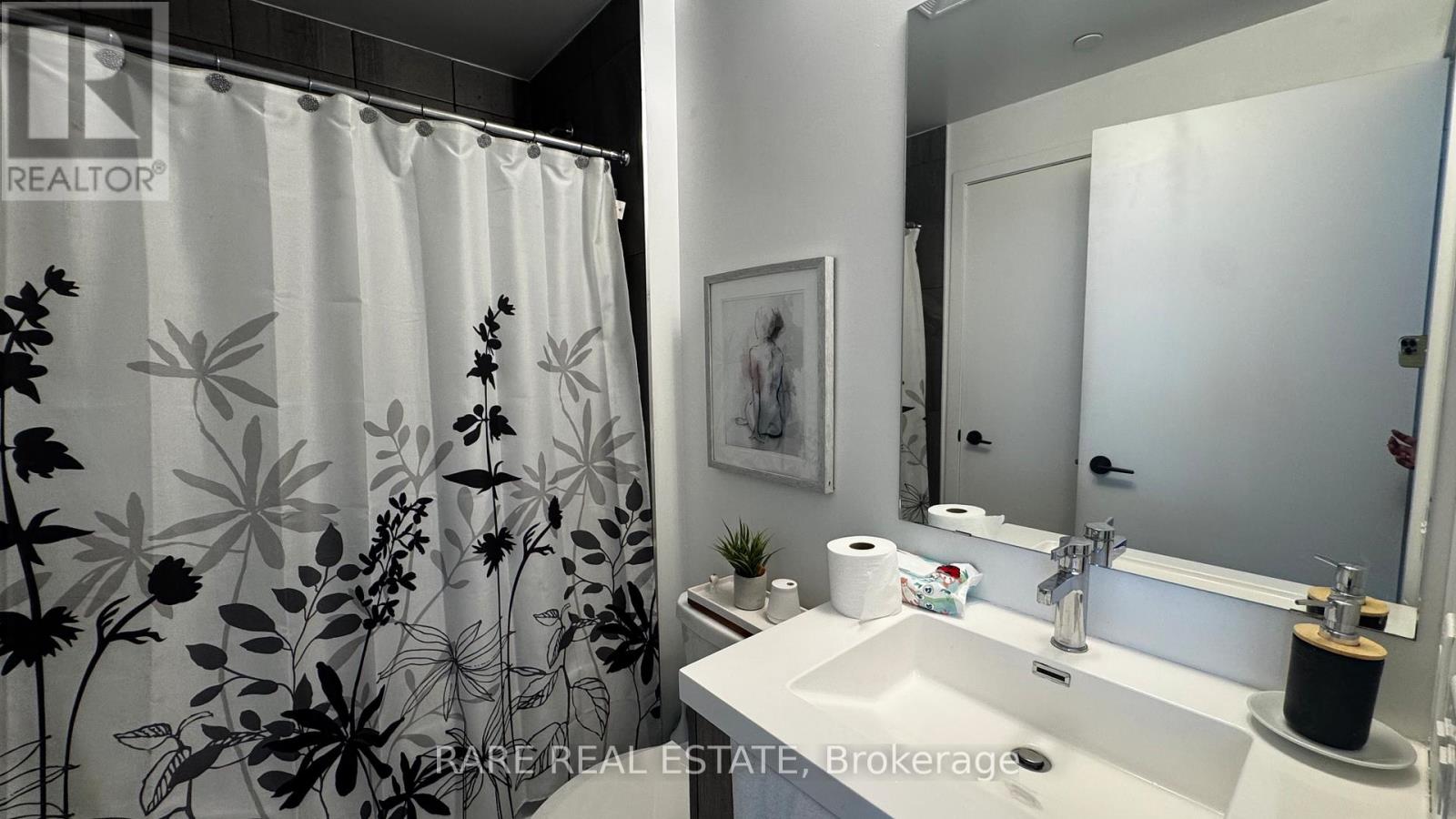 Photo 14 of 208 60 George Butchart Drive, Toronto ON