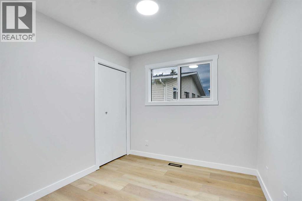 Single Family House Bi-level for Sale in B Queensland Drive SE Queensland Calgary 