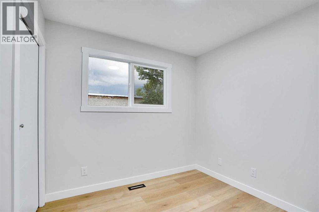 Single Family House Bi-level for Sale in B Queensland Drive SE Queensland Calgary 