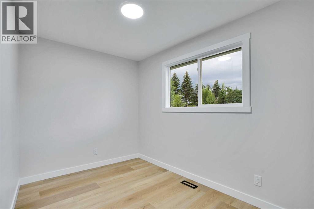 Single Family House Bi-level for Sale in B Queensland Drive SE Queensland Calgary 