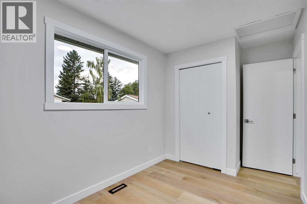 Single Family House Bi-level for Sale in B Queensland Drive SE Queensland Calgary 