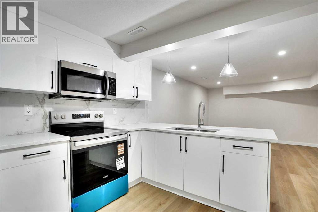 Single Family House Bi-level for Sale in B Queensland Drive SE Queensland Calgary 
