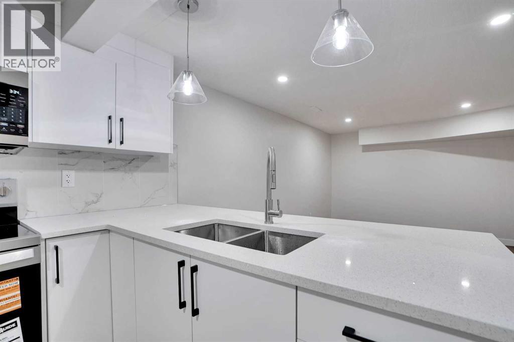 Single Family House Bi-level for Sale in B Queensland Drive SE Queensland Calgary 