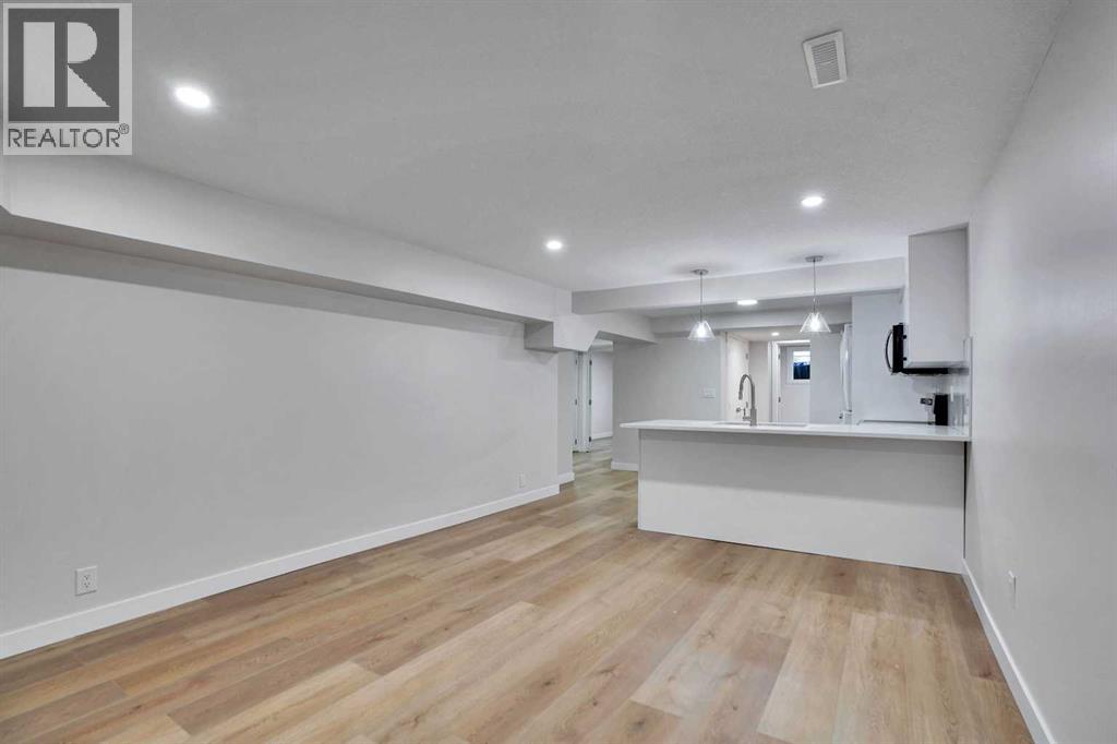 Single Family House Bi-level for Sale in B Queensland Drive SE Queensland Calgary 
