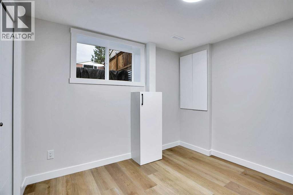 Single Family House Bi-level for Sale in B Queensland Drive SE Queensland Calgary 