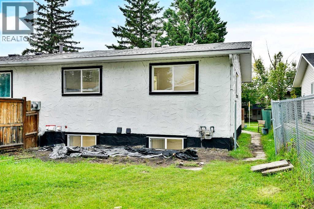 Single Family House Bi-level for Sale in B Queensland Drive SE Queensland Calgary 