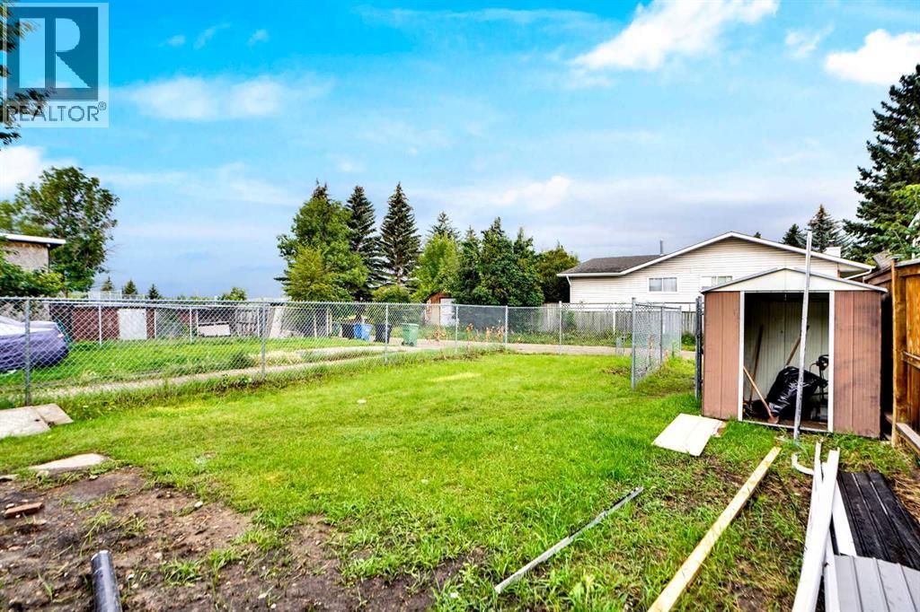 Single Family House Bi-level for Sale in B Queensland Drive SE Queensland Calgary 