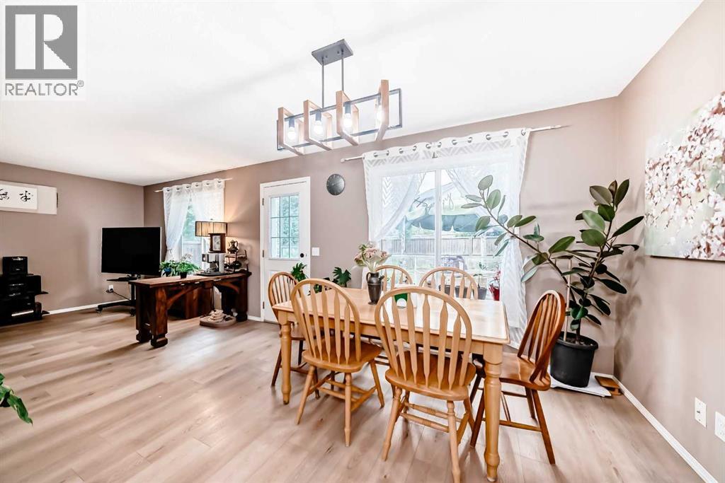 Photo 1 of 65 Cougarstone Circle Sw, Calgary AB