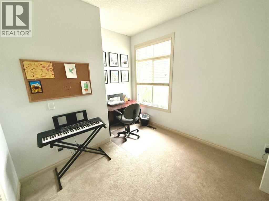 Photo 24 of 215 Hawkmere Road, Chestermere AB