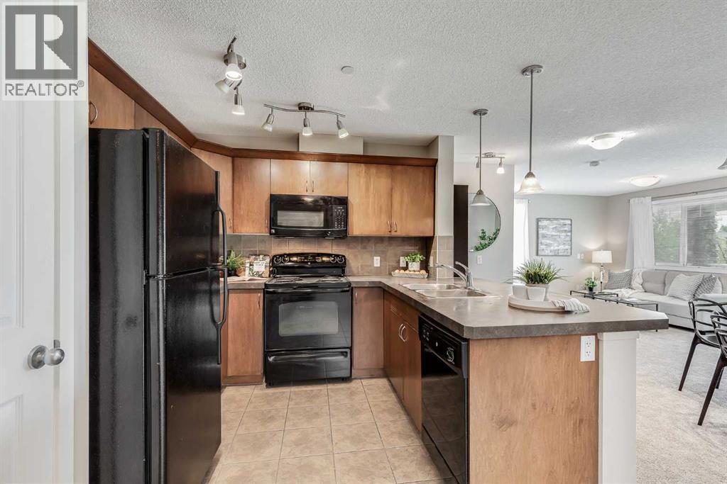 Photo 11 of 1202 4 Kingsland Close Se, Airdrie AB
