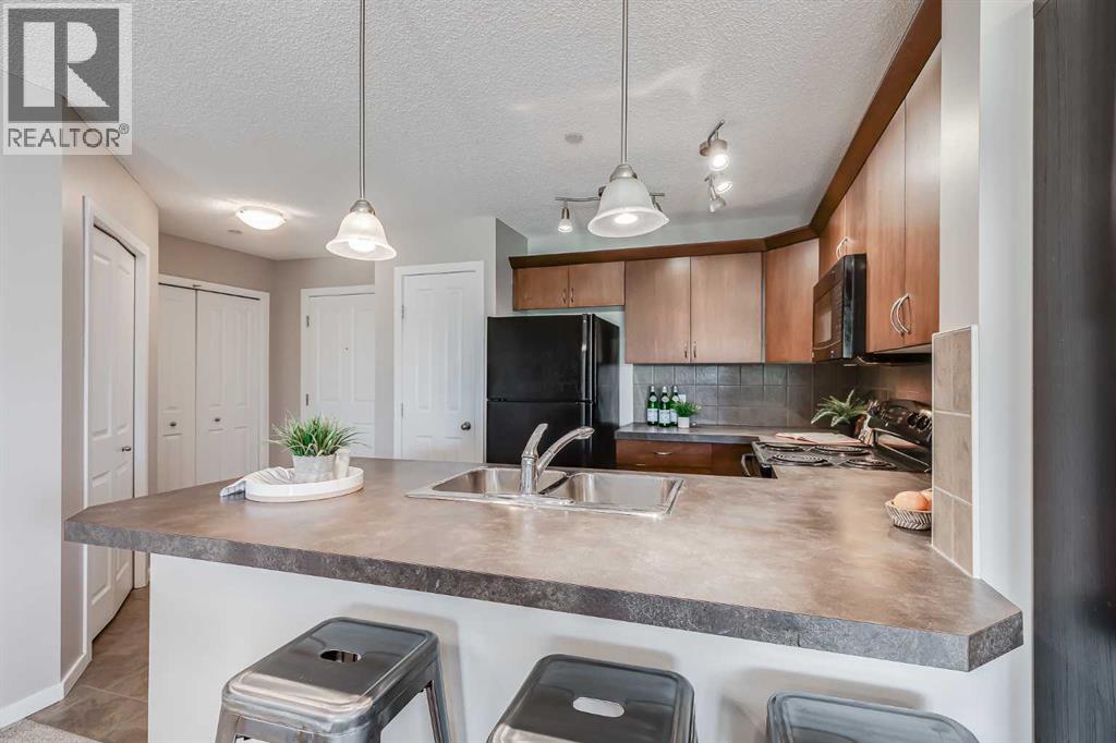 Photo 10 of 1202 4 Kingsland Close Se, Airdrie AB