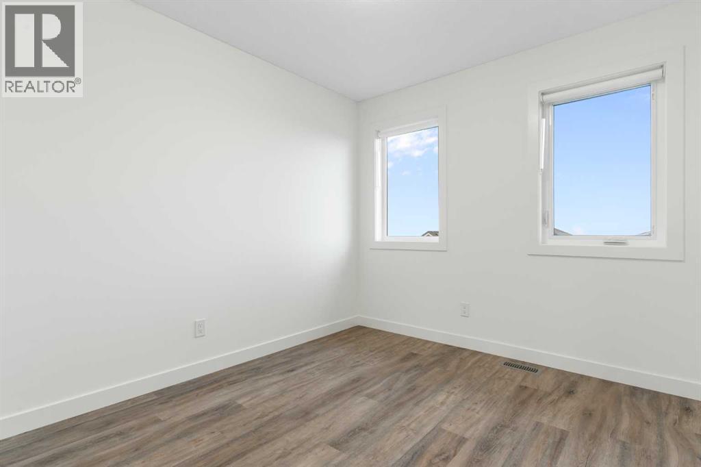 Photo 34 of 503 24 Rivercrest Drive, Cochrane AB