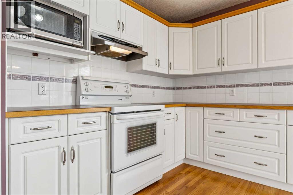 Single Family House Bi-level for Sale in  Harvest Hills Drive NE Harvest Hills Calgary 