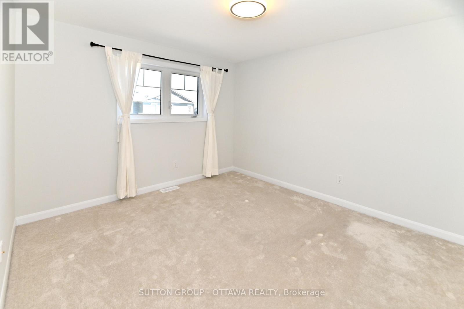Photo 18 of 64 Ralph Erfle Way, Ottawa ON
