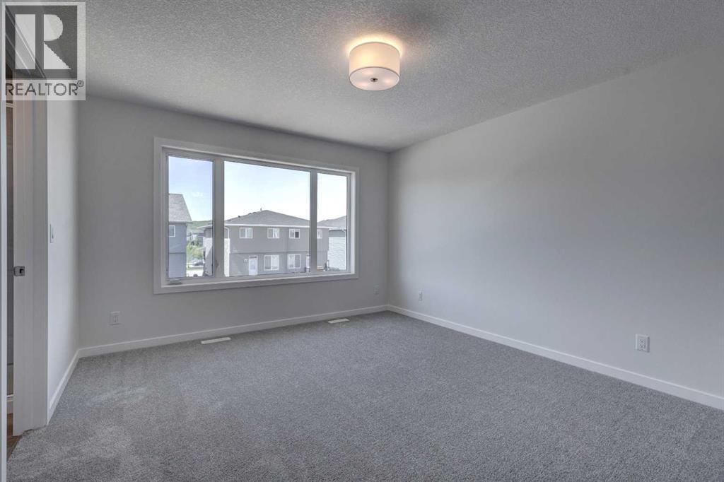 Single Family House for Sale in  Creekstone Circle SW Pine Creek Calgary 