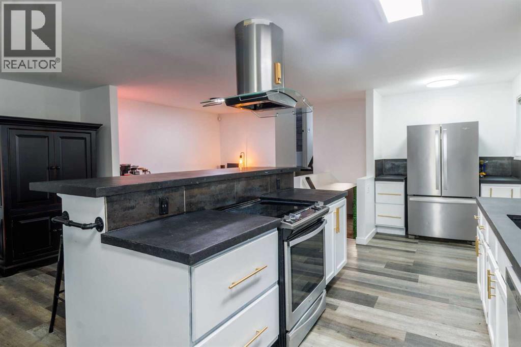 Single Family House 4 Level for Sale in  Erin Woods Drive SE Erin Woods Calgary 