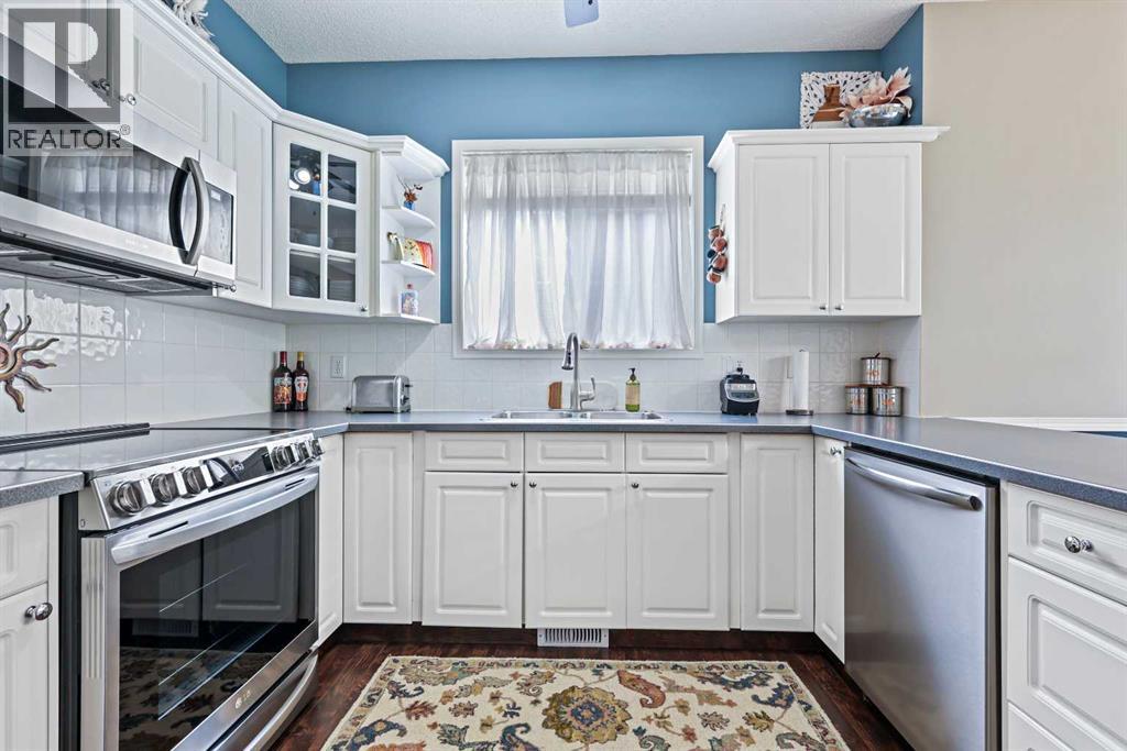 Single Family House Bungalow for Sale in  Signal Hill Lane SW Signal Hill Calgary 