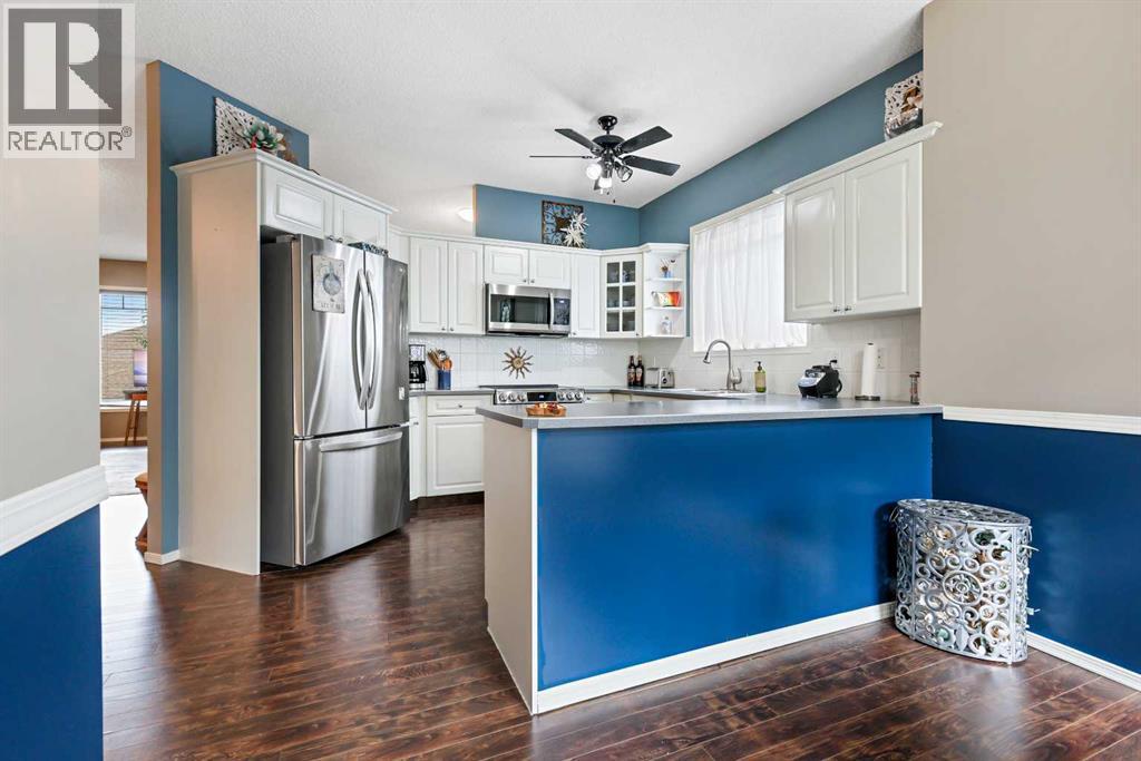 Single Family House Bungalow for Sale in  Signal Hill Lane SW Signal Hill Calgary 