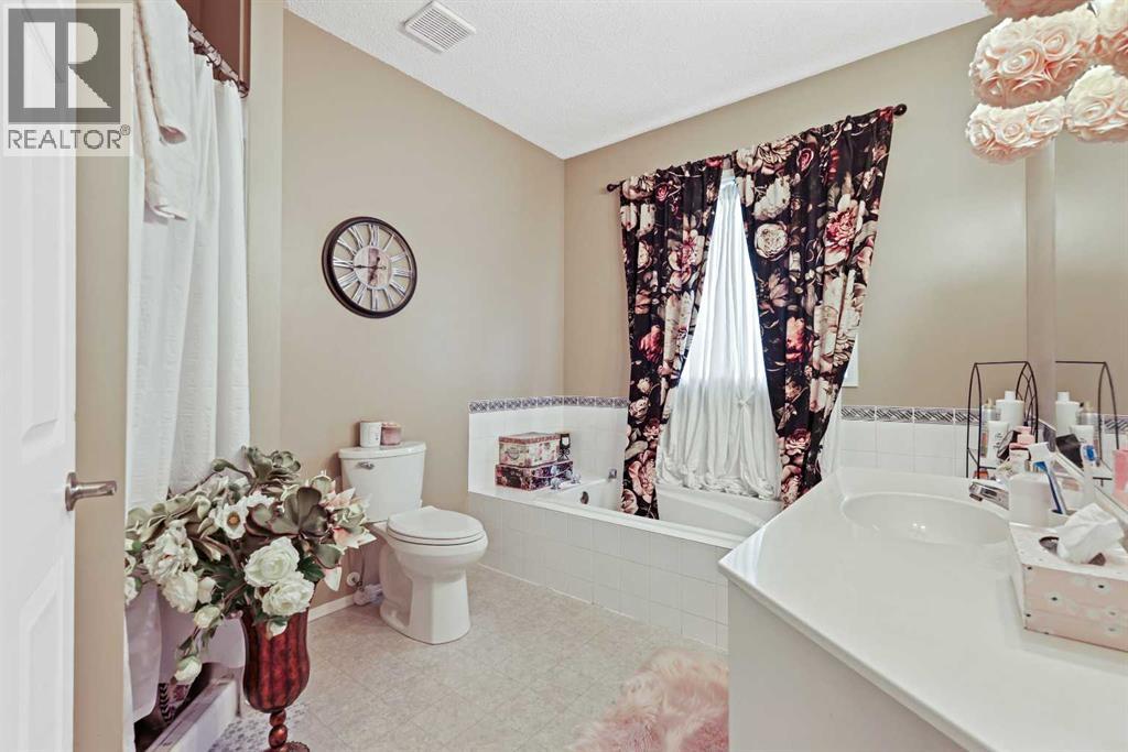 Single Family House Bungalow for Sale in  Signal Hill Lane SW Signal Hill Calgary 
