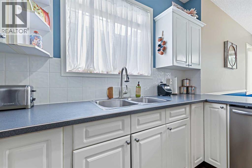 Single Family House Bungalow for Sale in  Signal Hill Lane SW Signal Hill Calgary 