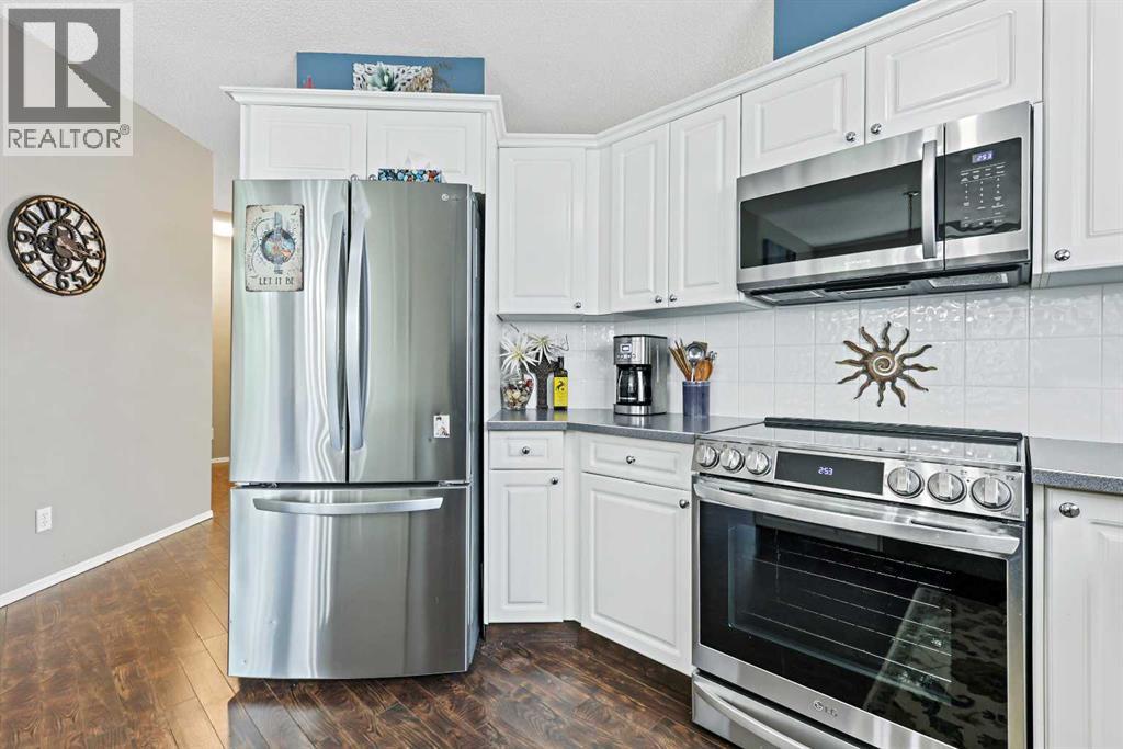 Single Family House Bungalow for Sale in  Signal Hill Lane SW Signal Hill Calgary 
