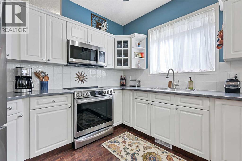 Single Family House Bungalow for Sale in  Signal Hill Lane SW Signal Hill Calgary 